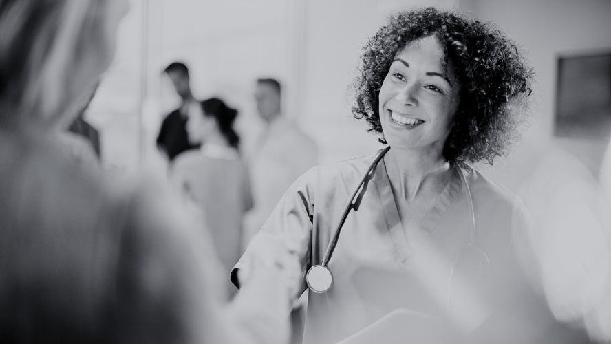 physician shaking patient's hand