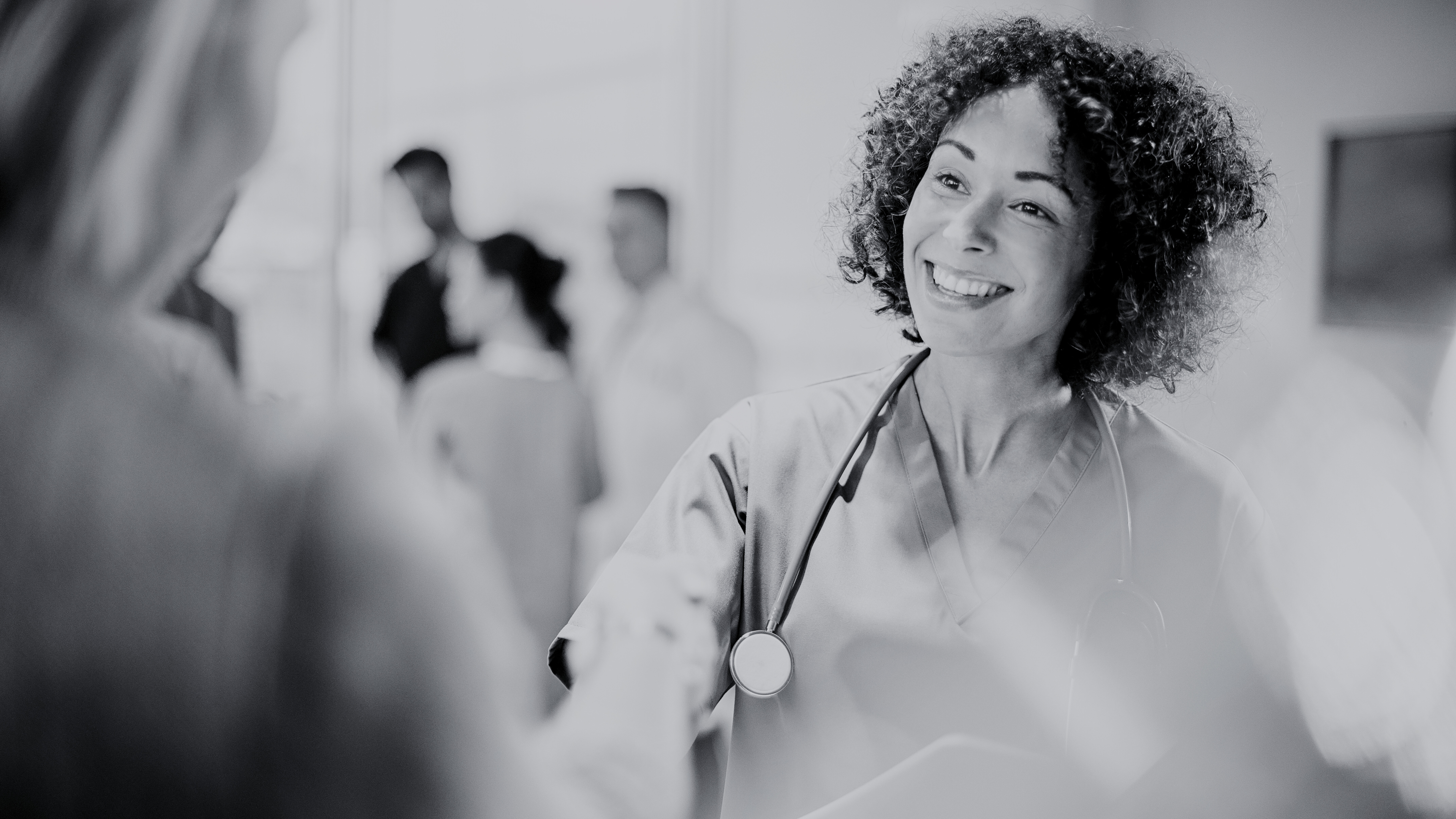 physician shaking patient's hand